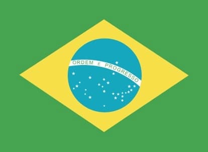 The Brazilian flag features a green field with a large yellow rhombus (diamond shape) in the center. Within the yellow rhombus is a blue celestial sphere depicting a starry sky with 27 white five-pointed stars of varying sizes, including the Southern Cross constellation. A curved white banner spans across the blue sphere with the national motto 'Ordem e Progresso' (Order and Progress) inscribed in green letters.