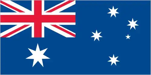 The flag of the Cocos (Keeling) Islands has a green field with a palm tree on a gold disc in the canton, a gold crescent in the centre, and the gold stars of the Southern Cross in the fly. Green and gold are Australia's national colours: the palm tree represents the islands' tropical vegetation, the crescent reflects the Islam of the Cocos Malay people, and the Southern Cross marks the islands' place in the Southern Hemisphere.