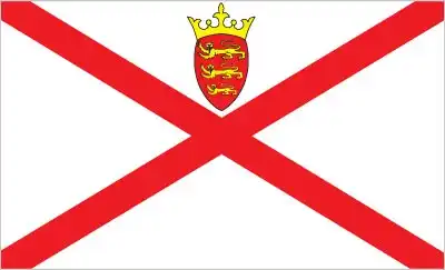 The flag of Jersey features a red saltire (diagonal cross) on a white field, surmounted in the upper quadrant by a small yellow Plantagenet crown above the island’s shield bearing three gold leopards—symbols that express loyalty to England while establishing Jersey’s distinct identity.
