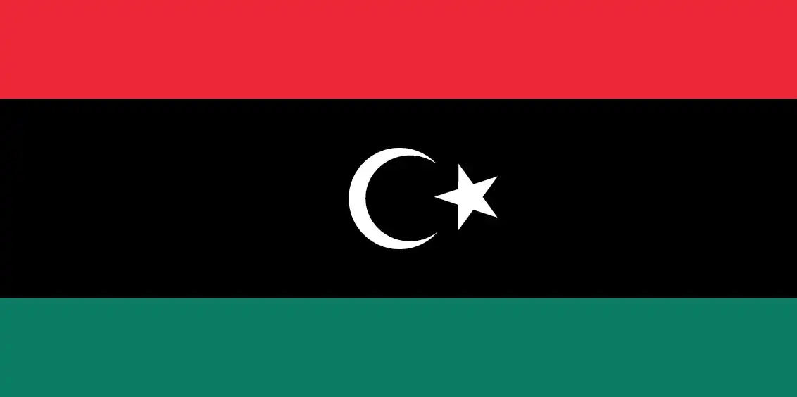 Libya’s national flag features a bold horizontal triband of red, black (double width), and green, with a white crescent and five-pointed star centered on the black stripe. It embodies both the historic unity of Libya’s three provinces and core Islamic identity.