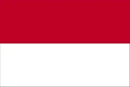 Monaco’s national flag consists of two equal horizontal bands—red over white—colors of the Grimaldi dynasty dating back to at least the 14th century. Its elegant simplicity reflects centuries of consistent principality symbolism.