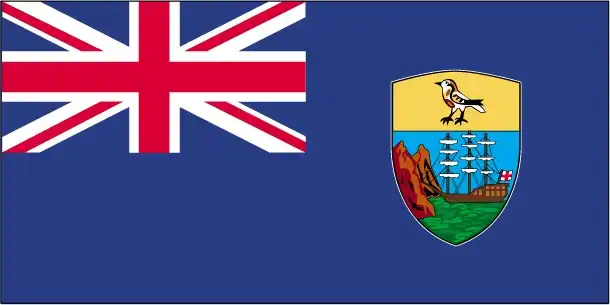 The flag of Saint Helena is a Blue Ensign defaced with the territory’s shield featuring a three‑masted sailing ship and the endemic wirebird (Saint Helena plover) standing atop rocky coastlines—an emblem of its remote South Atlantic island identity.