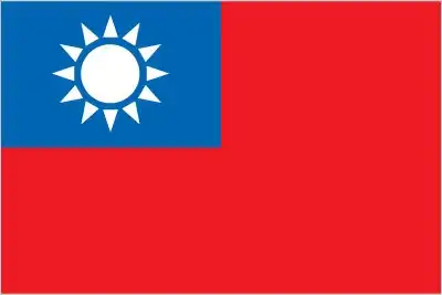 Taiwan Flag) - Taiwan’s flag displays a red field with a navy‑blue canton bearing a white sun with twelve triangular rays—known officially as “Blue Sky, White Sun, and a Wholl