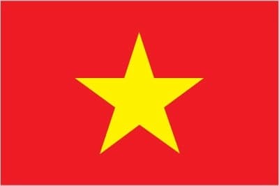 The national flag of Vietnam, known as the 'Red flag with a golden star' (Cờ đỏ sao vàng), features a large yellow five-pointed star centered on a red field. The red background symbolizes revolution and bloodshed, while the golden star represents the unity of the five main classes in Vietnamese society: intellectuals, farmers, workers, entrepreneurs, and soldiers.